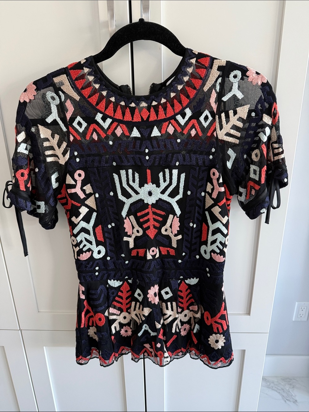 Parker Navy Embroidered Peplum Top with Multicolor Motifs